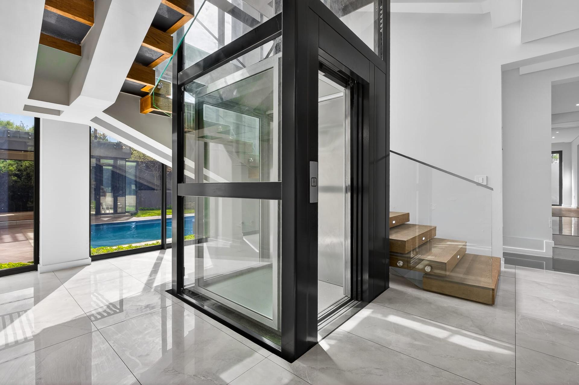 Architectural Triple-Storey Residence with Private Greenbelt Views — photograph 2